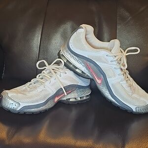 Nike Men’s White, Silver and Black Sneakers with Red Swoosh